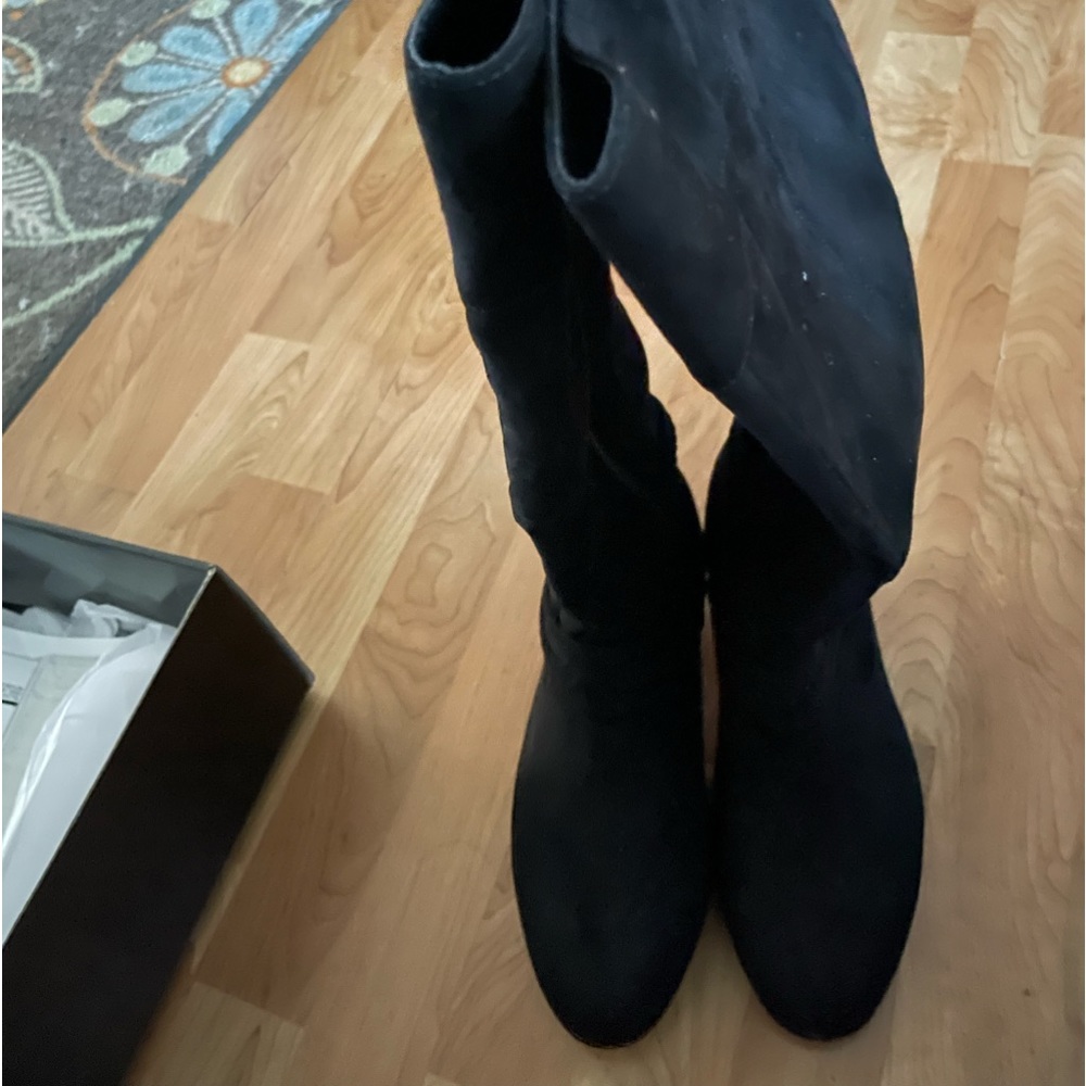 Brand new Torrid knee high boots.